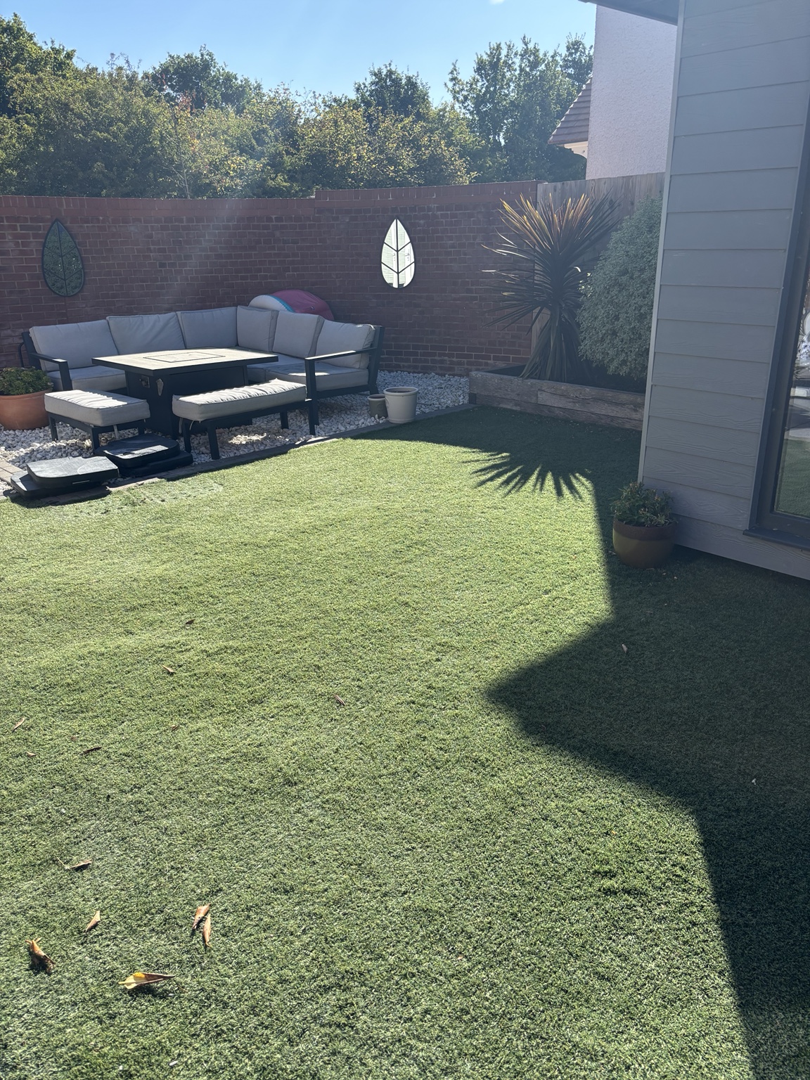 Artificial lawn before Green Revive restoration